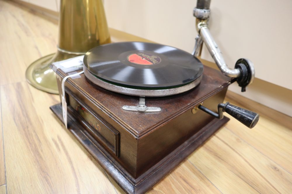 A table gramophone, The Shamrock, with horn, needles and two 78rpm records